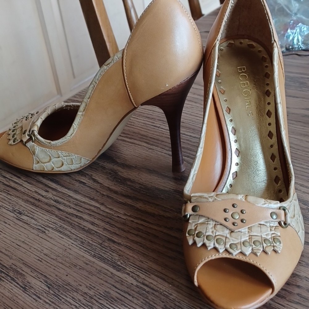 BCBGirls tan and brown peep toe heel with design on toe, 4" heel